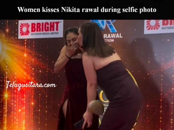 Women kisses Nikita rawal during selfie